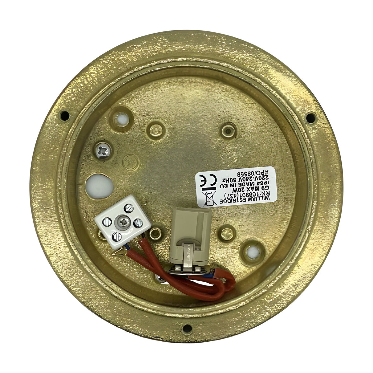 Rear view of the Marina Circular Bulkhead Light in raw brass, showing the G9 lampholder, terminal block, and wiring inside the brass backplate.