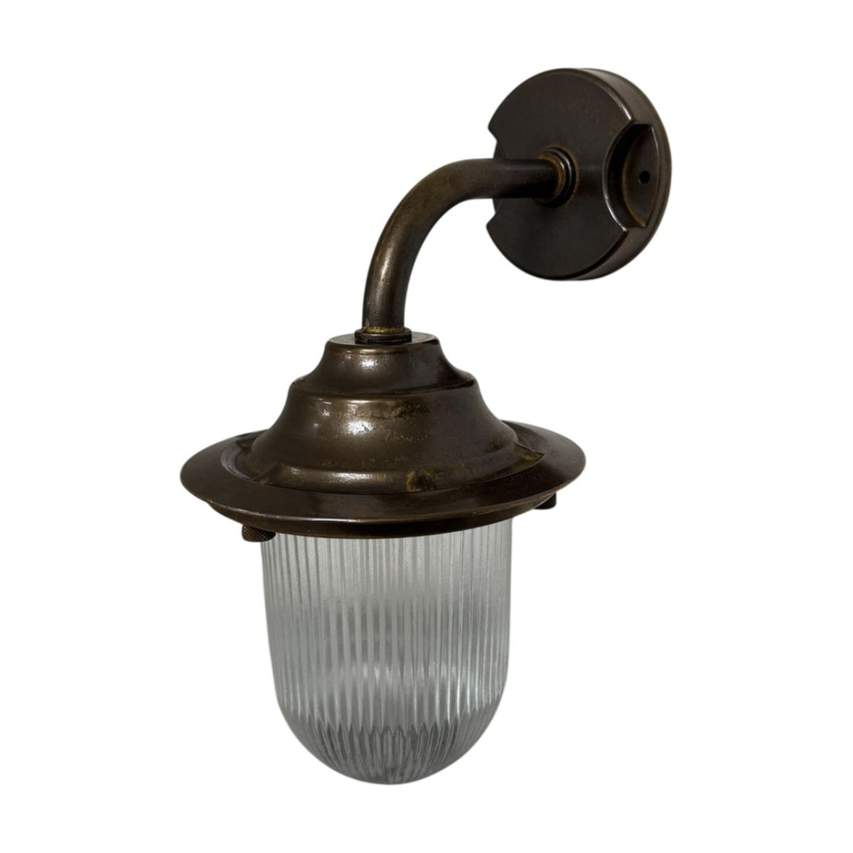 Quinn Outdoor Wall Lantern in antique brass with a goose neck arm, round wall plate, stepped flared hood and clear ribbed glass shade, IP64 rated, shown on a plain white background.