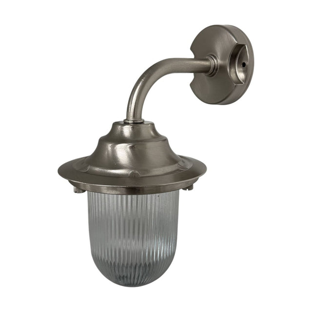 Quinn Outdoor Wall Lantern IP64 in satin nickel, a gooseneck wall light with round wall plate, curved arm, flared hood and clear ribbed glass shade, shown on a plain white background.