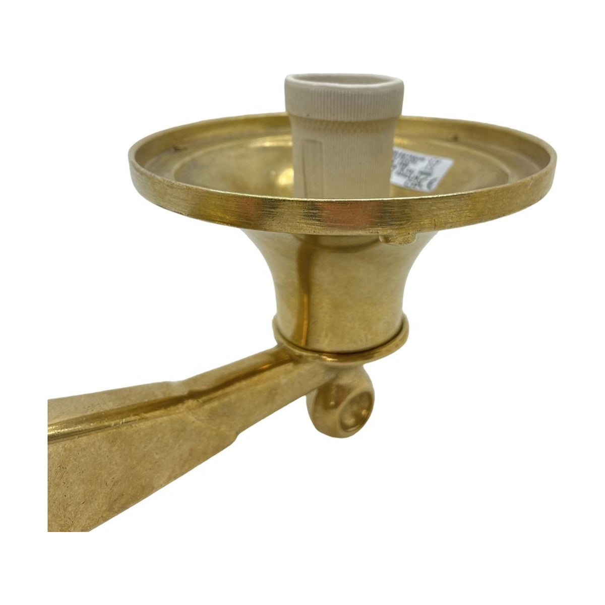 Close-up of the Tiller outdoor wall lantern in raw brass, showing the bell-shaped hood, round wall plate, and bracket arm with E27 bulb holder on a white background.