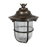 Hull Guard Outdoor Pendant Light in antique brass, a caged lantern with flared hood and ribbed glass shade on a chain, IP54 rated, shown on a white background.