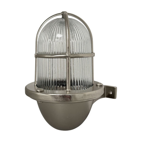 Armada Outdoor Wall Lantern in satin nickel, a caged uplight with ribbed glass dome, brass frame and rounded base, shown on a plain white background.