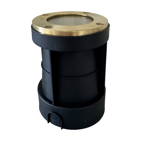 Bertha Recessed Ground Light IP67 in Raw Brass, round brass bezel with four screws and glass lens atop a black cylindrical housing, shown on a plain white background.
