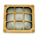 Francis Outdoor Wall Light IP64 in raw brass, a square bulkhead fixture with a nine-pane brass cage over frosted glass, corner screws, shown on a plain white background.