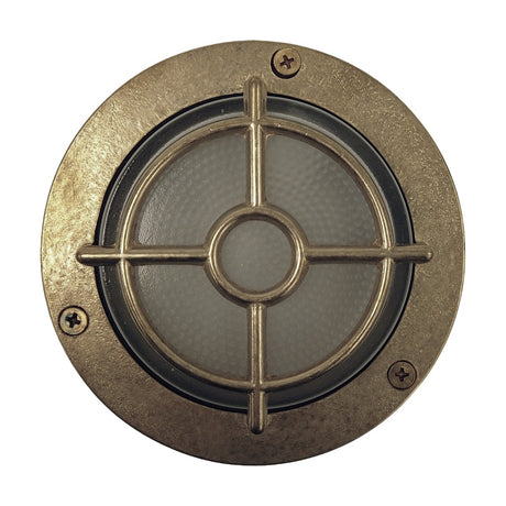 Walkway Guard outdoor wall light in raw brass, round flange with three cross-head screws, frosted glass lens covered by a crosshatch brass guard, IP65 rated, shown on a plain white background.