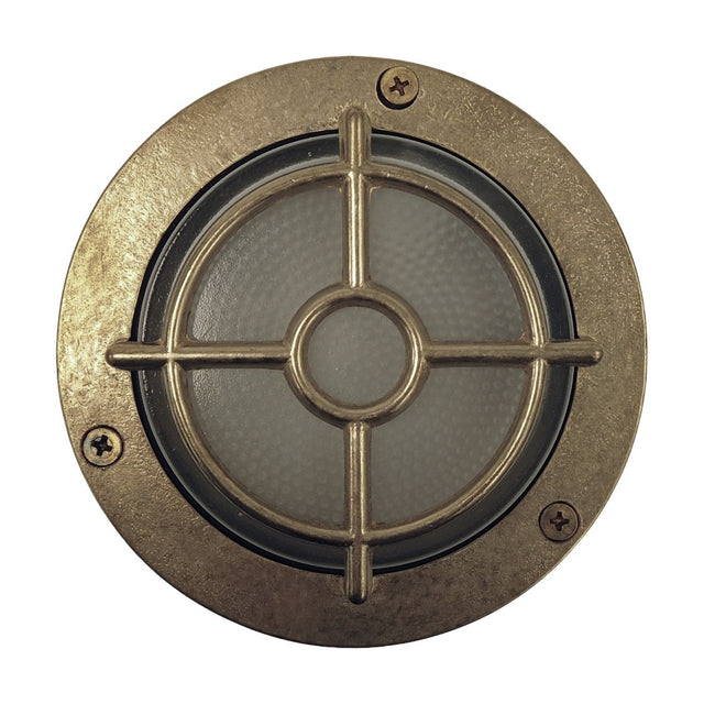 Walkway Guard outdoor wall light in raw brass, round flange with three cross-head screws, frosted glass lens covered by a crosshatch brass guard, IP65 rated, shown on a plain white background.