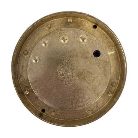 Rear view of the Walkway Eyelid Outdoor Wall Light in raw brass, showing the circular mounting plate with fixing holes and wiring aperture on a plain white background.