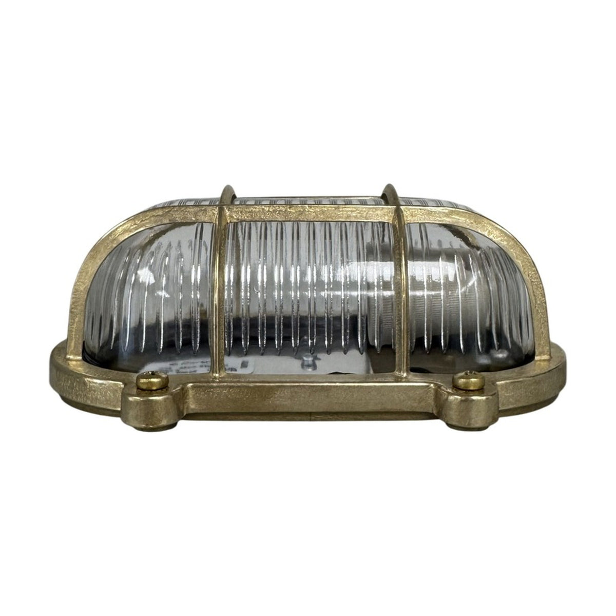 Merchant Flush Oval Bulkhead Light IP64 - Raw Brass