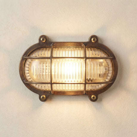 Merchant Flush Oval Bulkhead Light IP64 - Antique Brass