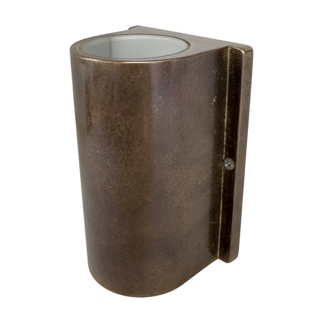 Pharos compact outdoor up & down wall light with cylindrical antique brass body, mounted on a slim rectangular wall plate, shown on a white background.