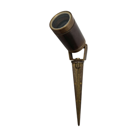 Marlinspike Garden Spike Light in antique brass, with a cylindrical, brown adjustable head on a pivoting bracket atop a tapered ground stake, shown on a plain white background.