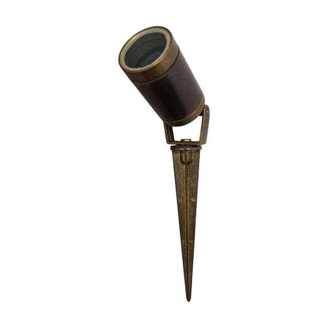 Marlinspike Garden Spike Light in antique brass, with a cylindrical, brown adjustable head on a pivoting bracket atop a tapered ground stake, shown on a plain white background.
