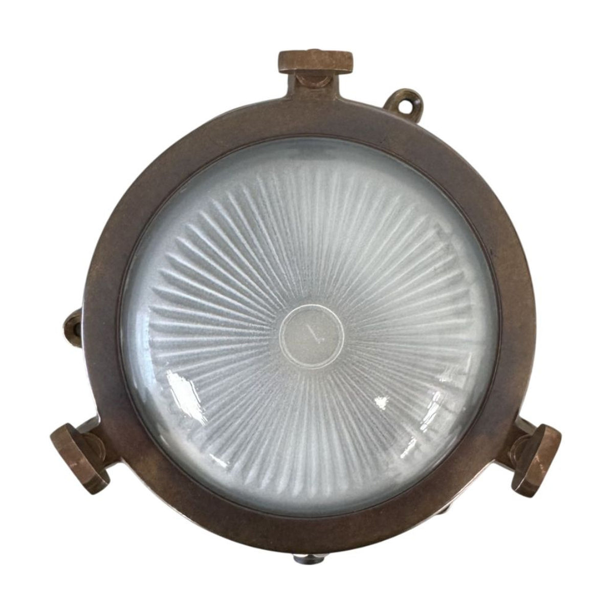 Mini Compass Bulkhead Light replacement glass with ribbed sunburst texture, set within an aged brass-finish fixture frame, shown on a white background.