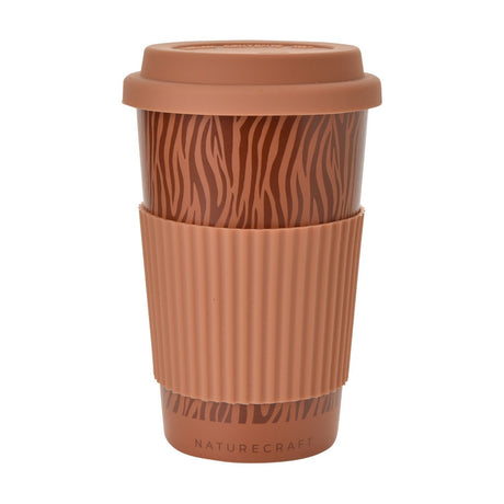 Tiger print travel mug with brown stripes on orange, featuring a push-on silicone lid and ribbed orange silicone grip sleeve, shown on a plain white background.