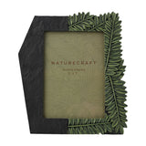 Flagstone Fern Leaf resin photo frame for a 7 x 5in portrait, with raised green fern leaves on top, right, and bottom edges against a dark textured left panel, on white background.