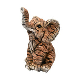 Sitting elephant resin figurine, 39.5cm, with raised trunk, open mouth, fanned ears and faceted brown-terracotta textured surface, on a plain white background.