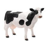 Standing Cow Resin Figurine, 33cm, with textured white coat, bold black patches on shoulders and hindquarters, black ears and hooves, shown on a plain white background.