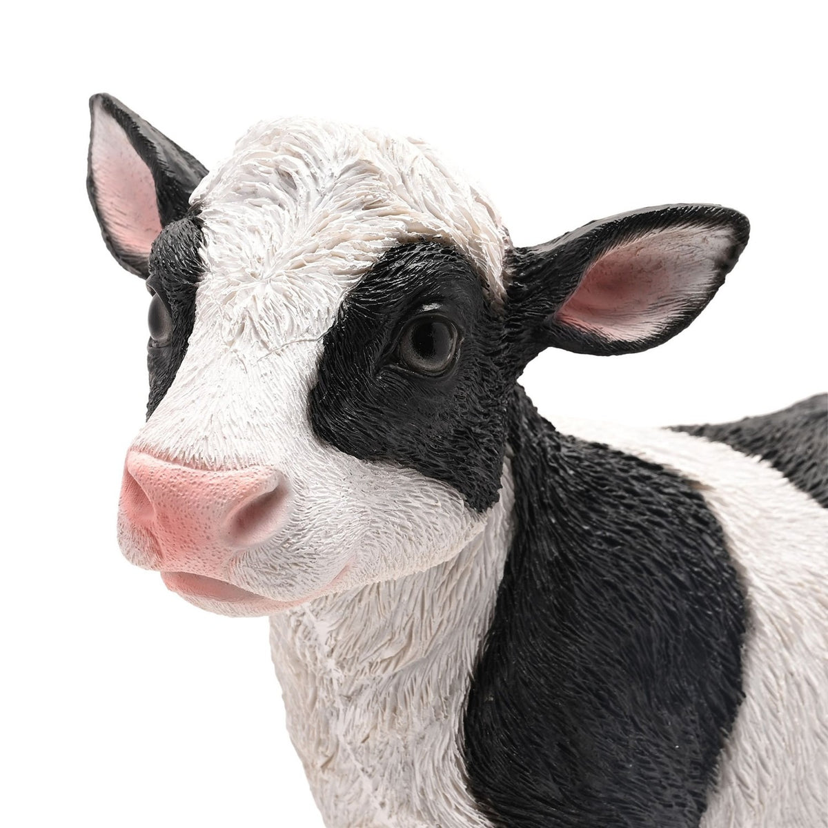Close-up of the Standing Black Patch Cow Resin Figurine, 30cm, showing its textured white coat, black patches, pink nose and ears, and glossy dark eyes against a plain white background.
