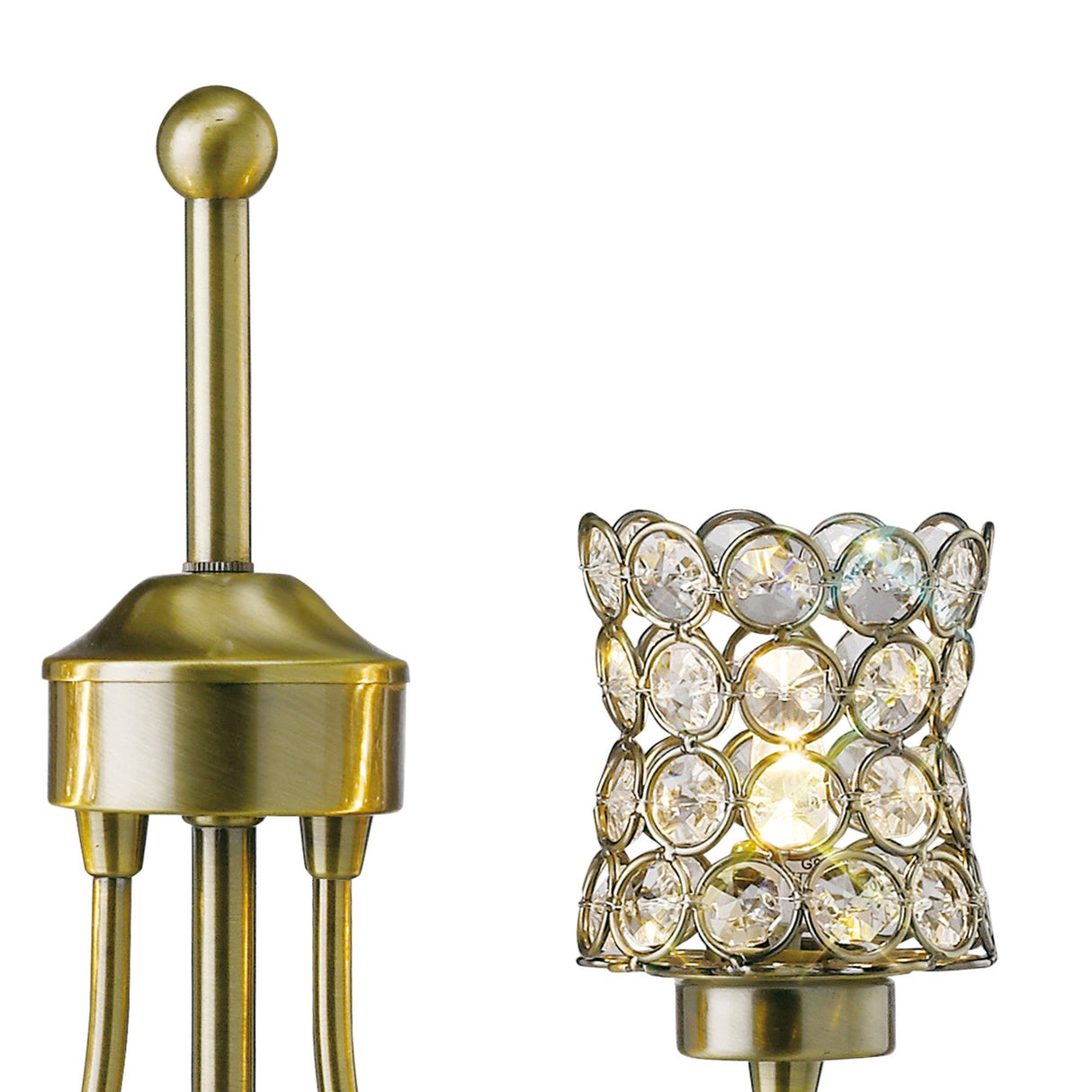 Close-up of the Nelson 2 Light Crystal Table Lamp in antique brass, featuring a decorative shade with circular crystal-like pieces in a metal frame and an elegant vintage gold-finish design.