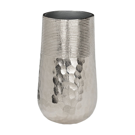 Nilgaut Vase 28cm in nickel-finish aluminium, with a ribbed upper band and hammered, dimpled lower body, tapering gently to the base against a plain white background.