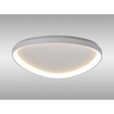 Mantra Niseko triangular LED flush ceiling light with white metal frame and white acrylic diffuser, shown ceiling-mounted against a light grey background.