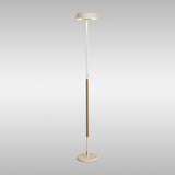 The Noa II Touch Dimmer LED Floor Lamp (15W, 3000K) in white with a beech accent combines Scandinavian minimalism—a slim stand, round shade, and circular base—perfect for modern elegance against a light gray background.