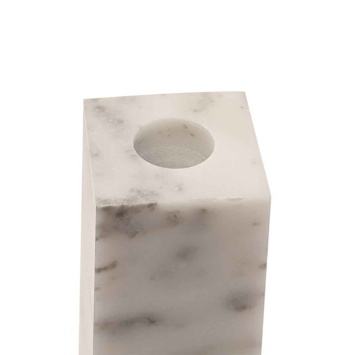 Close-up of a rectangular white marble candle holder with grey veining and a round cup set into the top, shown on a plain background.