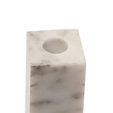 Close-up of a rectangular white marble candle holder with grey veining and a round cup set into the top, shown on a plain background.