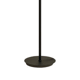A close-up of the Nora 1 Light Chrome Glass Floor Lamp showcases its modern design, featuring a black marble base with a round, flat bottom and a slim vertical pole in black.