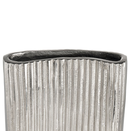 Close-up of the Nosimaro Vase 22cm in nickel, showing its aluminium body with vertical ribbed texture and a wavy-edged opening in darker metal tone, against a plain white background.