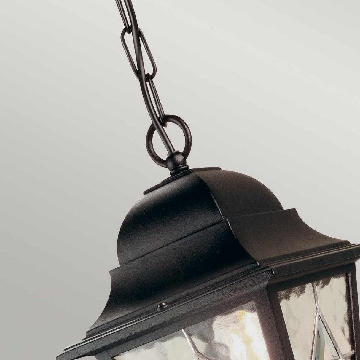 Close-up view of the Norfolk 1 Light Outdoor Chain Pendant in black, showcasing its classic lantern-inspired design with clear hand-leaded glass panels. The pendant is suspended by a chain against a plain background.