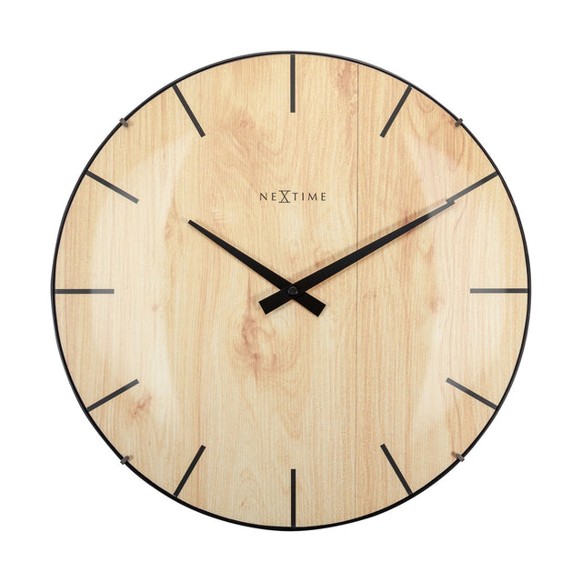 Round wall clock with a warm brown wood-grain dial under a domed glass front, slim black baton hour markers, black hands, and a thin black rim, shown on a plain white background.