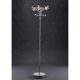The Octavia 4 Light Crystal Floor Lamp in polished chrome features crystal-like accents, a round base, and decorative top to provide ambient lighting—perfect for adding elegance against a dark background.