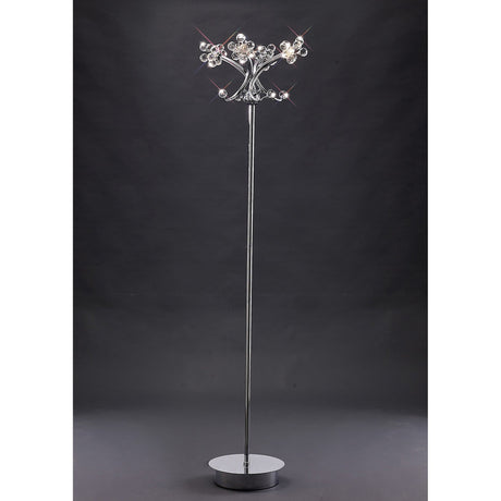 The Octavia 4 Light Crystal Floor Lamp in polished chrome features crystal-like accents, a round base, and decorative top to provide ambient lighting—perfect for adding elegance against a dark background.
