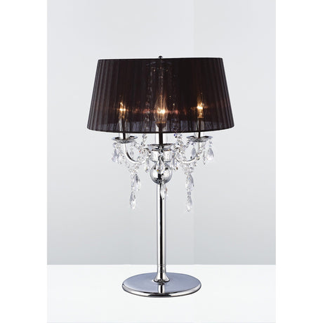 The Olivia 3 Light Crystal Table Lamp features a polished chrome finish, black shade, and elegant crystal accents beneath each bulb for a refined, modern look.