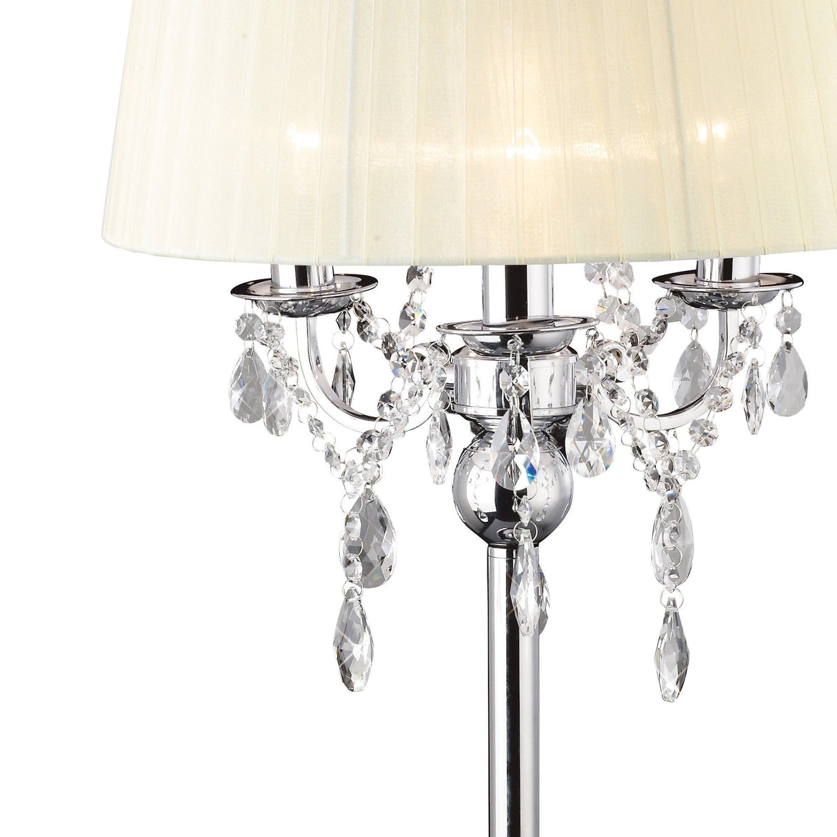 The Olivia 3 Light Crystal Table Lamp features a polished chrome base, an ivory cream shade, and is adorned with sparkling crystal ornaments and beads.