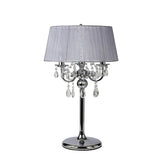 The Olivia 3 Light Crystal Table Lamp features a polished chrome finish, crystal accents and pendants, a grey fabric shade, and a reflective round base for stunning ambient lighting.