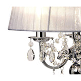 Close-up of the Olivia 3 Light Crystal Table Lamp in polished chrome, featuring hanging crystal ornaments and a soft grey shade for ambient lighting.