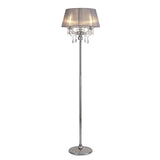 The Olivia 3 Light Crystal Floor Lamp features a chrome metal stand, round base, grey fabric shade, and sparkling hanging crystals below the shade.