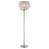 The Olivia 3 Light Crystal Floor Lamp features a tall chrome stand, round base, white pleated shade, and decorative crystal accents hanging beneath the shade—a stylish addition to any room.