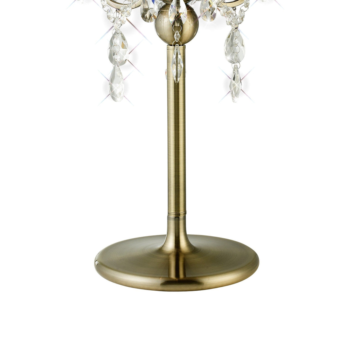 Close-up of the base and lower stem of the Olivia 3 Light Crystal Table Lamp in antique brass, featuring a round metal base with clear crystal decorative accents, and finished with a cream shade.
