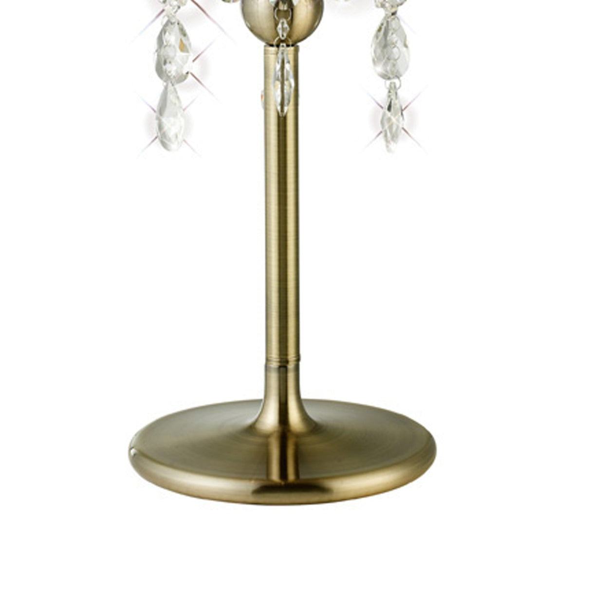 A close-up of the Olivia 3 Light Crystal Table Lamp in antique brass with a brushed finish, featuring clear hanging crystals and a white shade—perfect for adding elegance to your interior lighting.
