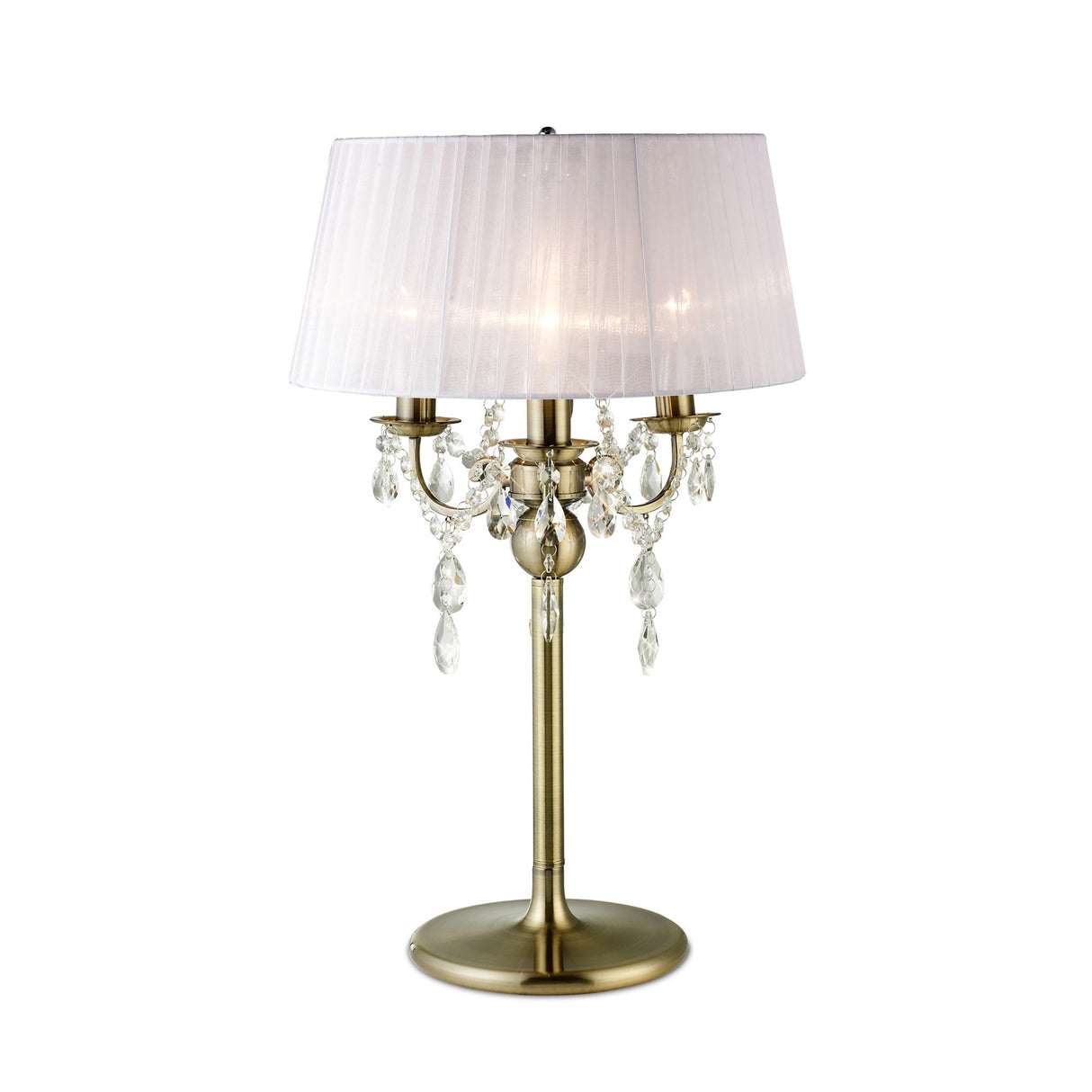 The Olivia 3 Light Crystal Table Lamp features antique brass, a white pleated shade, three candle-style bulbs, and hanging crystal accents—an elegant lighting solution for any room.