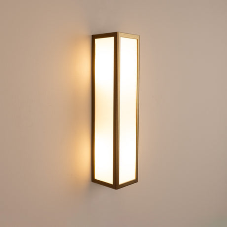 Olvery Twin Acrylic Lantern Wall Light IP65 in bronze finish, a tall slim square frame with glowing opal acrylic panels, mounted on a plain light grey wall.