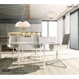 Mantra Opal frosted glass flush ceiling light and pendant shown in a modern dining room with glass table, white chairs and chrome accents.