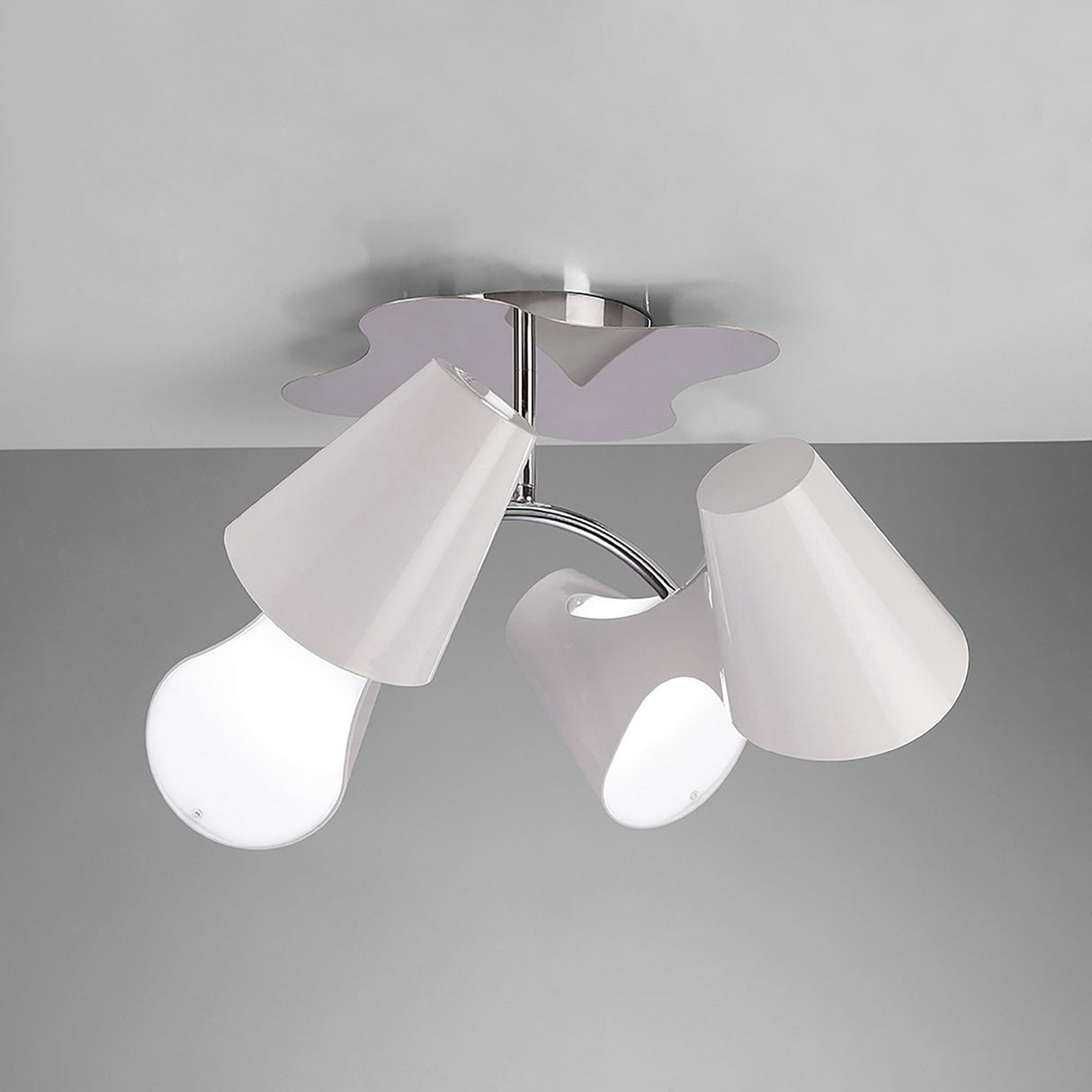 Mantra Ora 4 light semi-flush ceiling light with gloss white curved shades and polished chrome hub, mounted to a light grey ceiling.