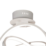 Close-up of the Mantra Orbital LED semi-flush ceiling light's matt white cylindrical mount and ceiling plate, with interlocking aluminium rings below.