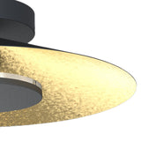 Close-up of the Mantra Orion LED semi-flush ceiling light showing the matt black canopy and shallow dome with hand-applied gold leaf interior.