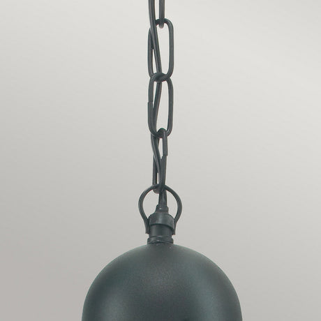 A close-up of the Oslo Outdoor 1 Light Chain Pendant in black showcases its round metal shade in galvanized steel and chain link attachment against a light gray background, reflecting sleek Scandinavian design.