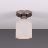 Osier Ceramic Flush Ceiling Light in Matt White Striped glaze, a single-light fixture with a textured bell-shaped shade on a round silver-toned ceiling plate, shown against a plain grey background.